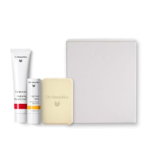 Dr. Hauschka hand and lip care set with cream tube, lip care stick, soap bar and gift box.