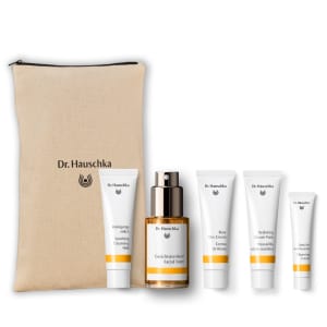 Dr. Hauschka skincare gift set in a beige pouch, with cleansing milk, facial toner, rose day cream, mask and cleansing cream.