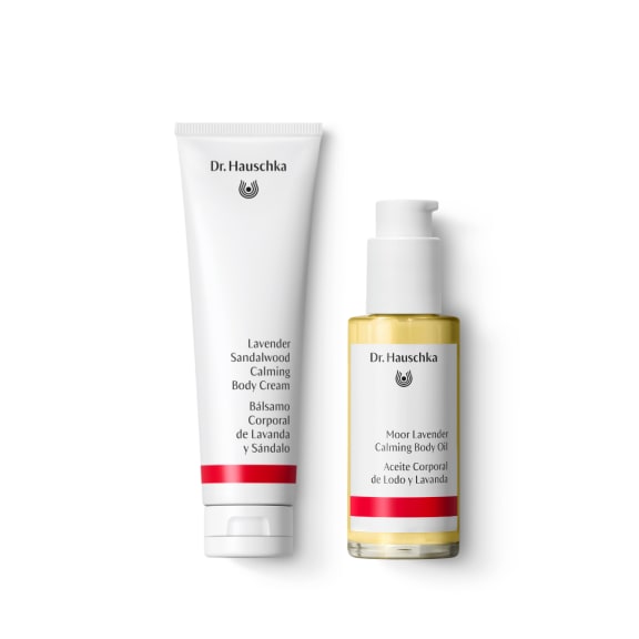 Dr. Hauschka Lavender Sandalwood Calming Body Cream and Moor Lavender Calming Body Oil on white background.