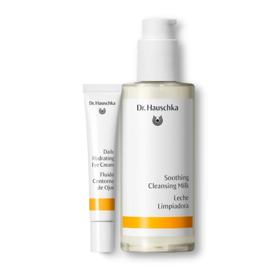 Dr. Hauschka eye care duo: Daily Hydrating Eye Cream tube beside Soothing Cleansing Milk pump bottle.
