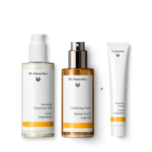 Dr. Hauschka skincare gift set: Soothing Cleansing Milk, Clarifying Toner, and Cleansing Cream on white background.