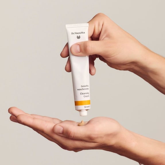 cleansing cream applied to hand