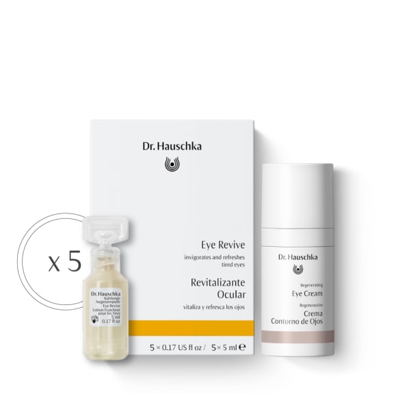 Dr. Hauschka eye care duo: Eye Revive ampoules, Regenerating Eye Cream, and a box on a white background.