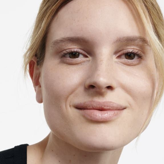 woman smiling with lipstick