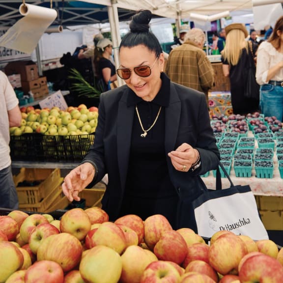 Martina Halloran, CEO, shopping in farmers market