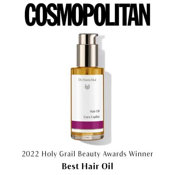 Dr. Hauschka Hair Oil bottle on white background with Cosmopolitan and 2022 Holy Grail Beauty Awards winner text.