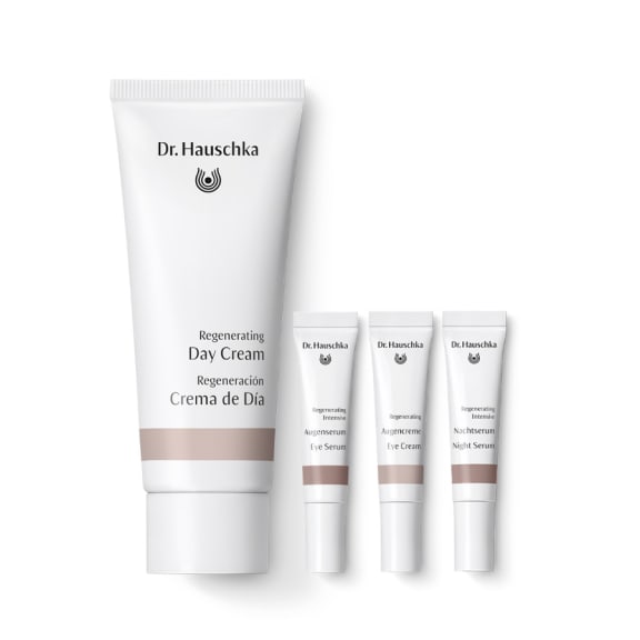 Dr. Hauschka regenerating travel gift set with one large day cream tube and three mini skincare tubes.