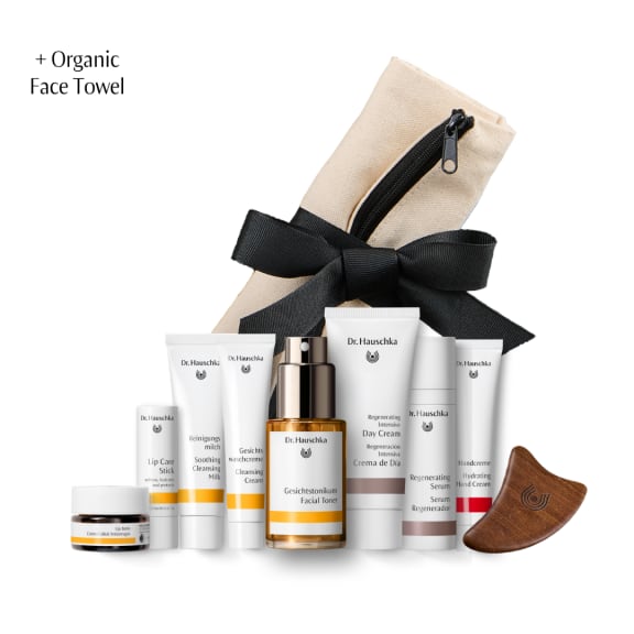 Dr. Hauschka anti-age advent set with skincare tubes, toner, lip balm, wooden gua sha and an organic face towel.