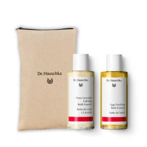 Dr. Hauschka bath essence gift set with beige pouch and two bottles, Moor Lavender and Sage Purifying.