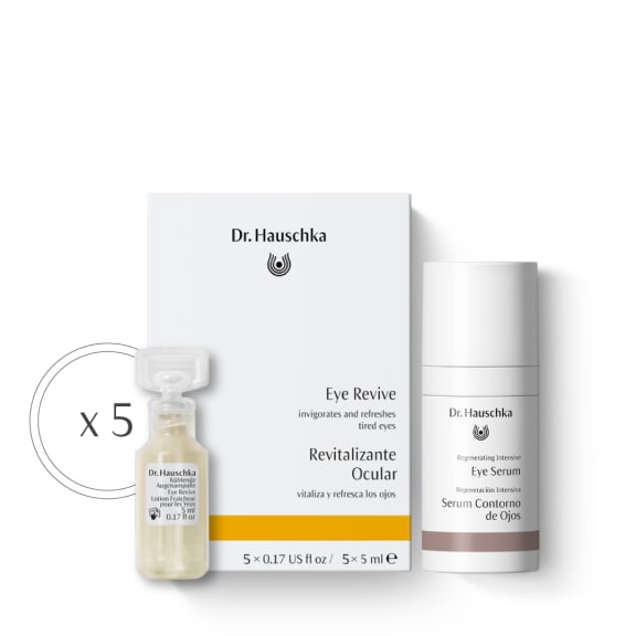 Dr. Hauschka Eye Revive and Regenerating Intensive Eye Serum duo with five ampoules, box and bottle on white.