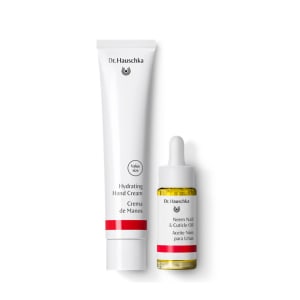 Dr. Hauschka hand care set with Hydrating Hand Cream tube and Neem Nail & Cuticle Oil bottle on white background.