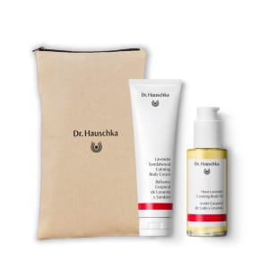 Dr. Hauschka lavender calming gift set with a canvas pouch, body cream tube and body oil bottle.